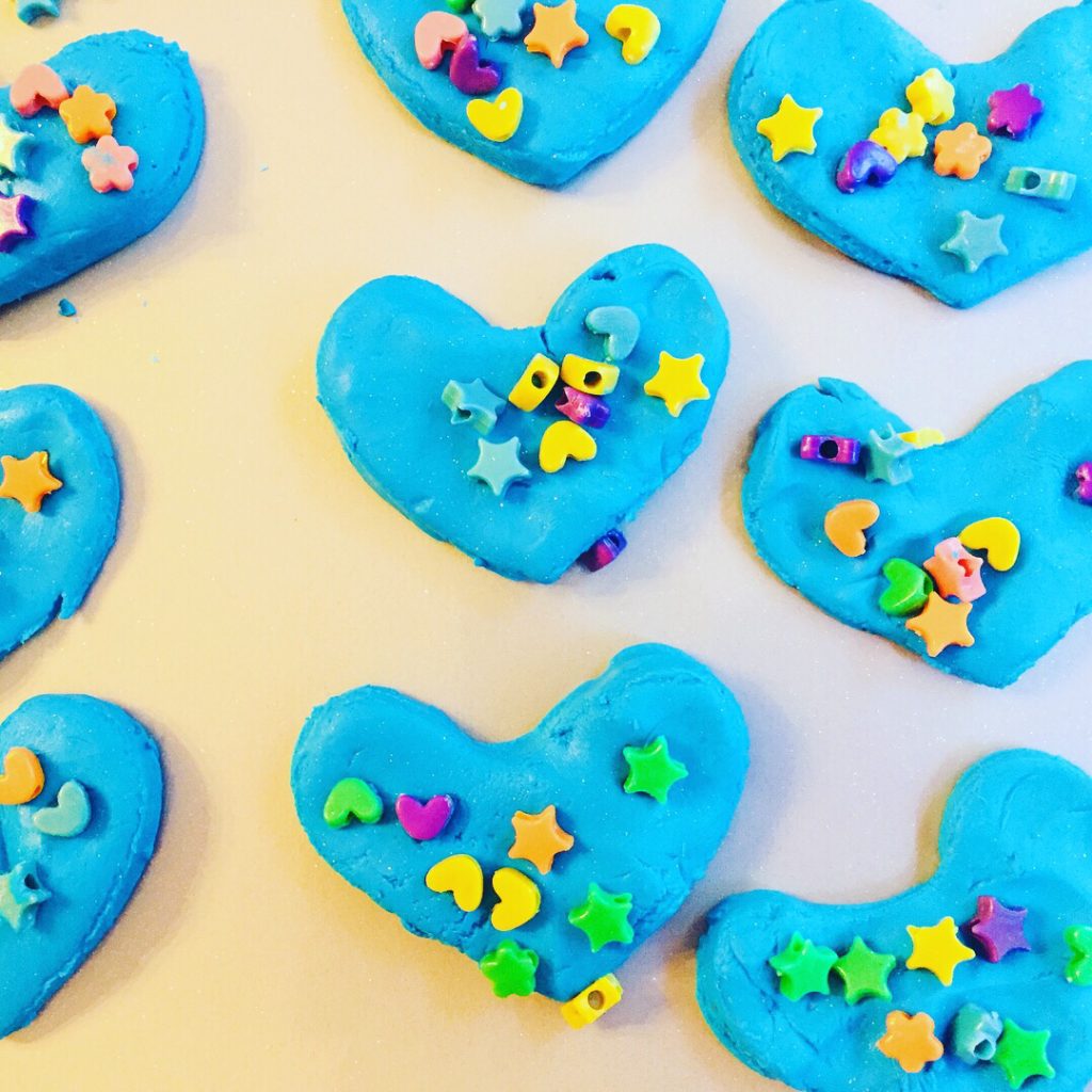 Book Activity Craft based on Have You Filled A Bucket Today. Kindness hearts make from blue sparkly cloud dough.