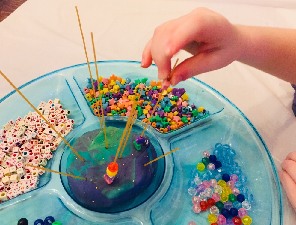 Spaghetti Bead Towers are a fun fine motor activity for preschoolers!