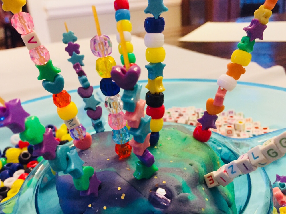 Spaghetti Bead Towers are a fun fine motor activity for preschoolers!