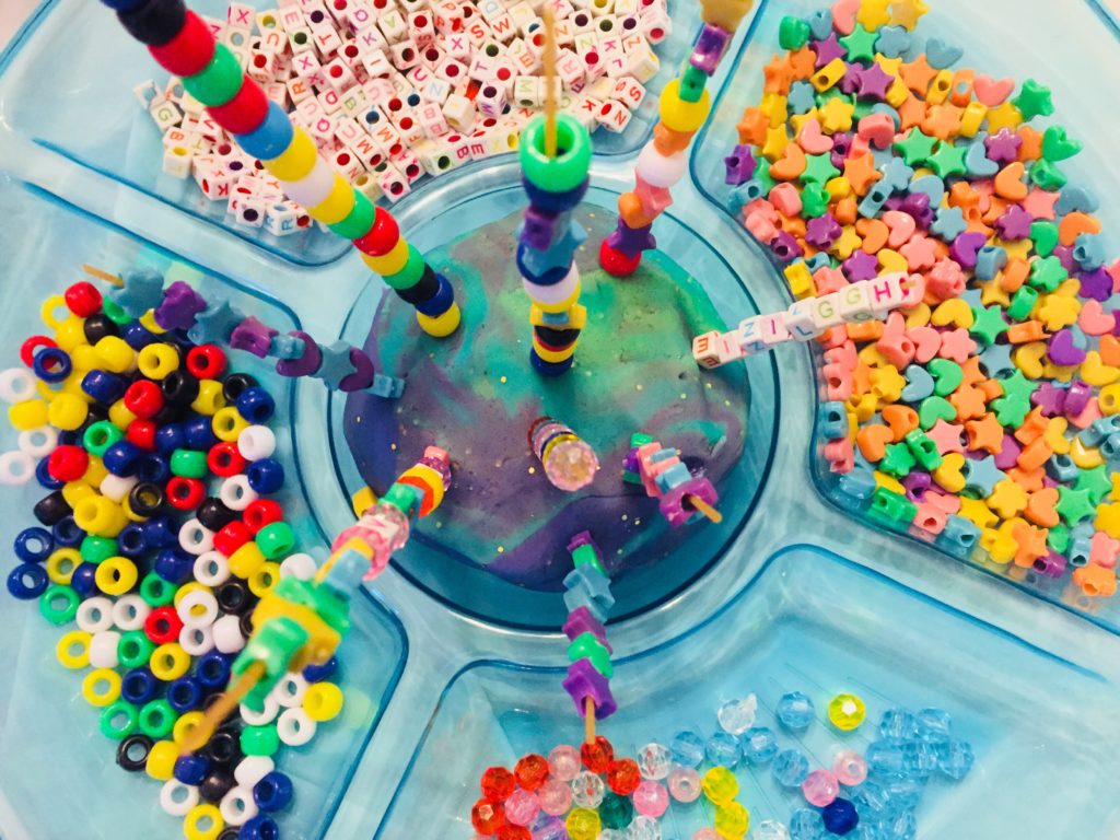 Spaghetti Bead Towers are a fun fine motor activity for preschoolers!