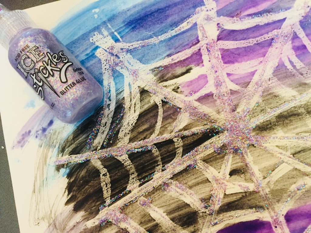 Watercolor Resist Glitter Spider Web Art - A fun and sparkly Halloween craft for kids of all ages!