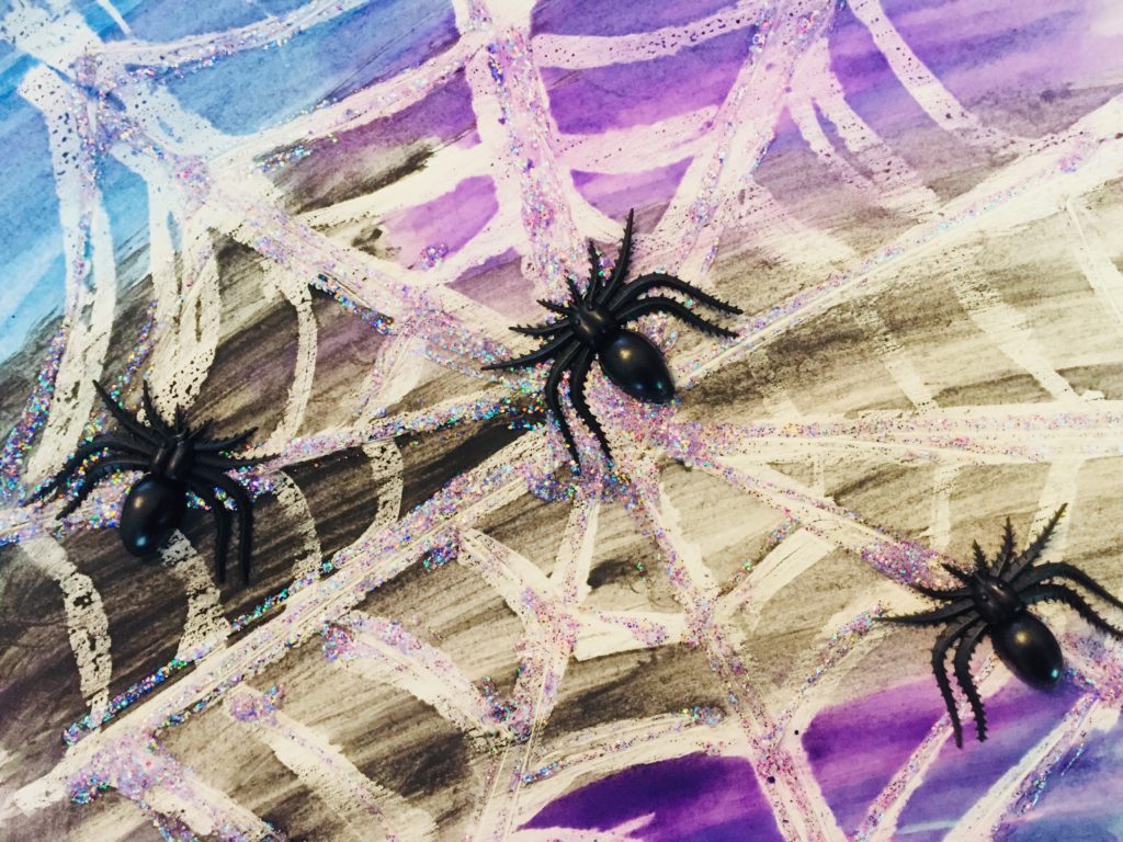 Water Color Resist Glitter Spider Web Art - A fun and sparkly Halloween craft for kids of all ages!