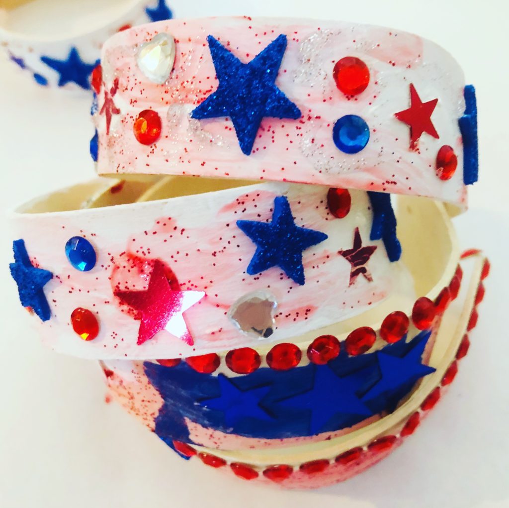 Patriotic Popsicle Stick Bracelets - such a fun craft with lots of bling! Perfect for Memorial Day or 4th of July crafting.