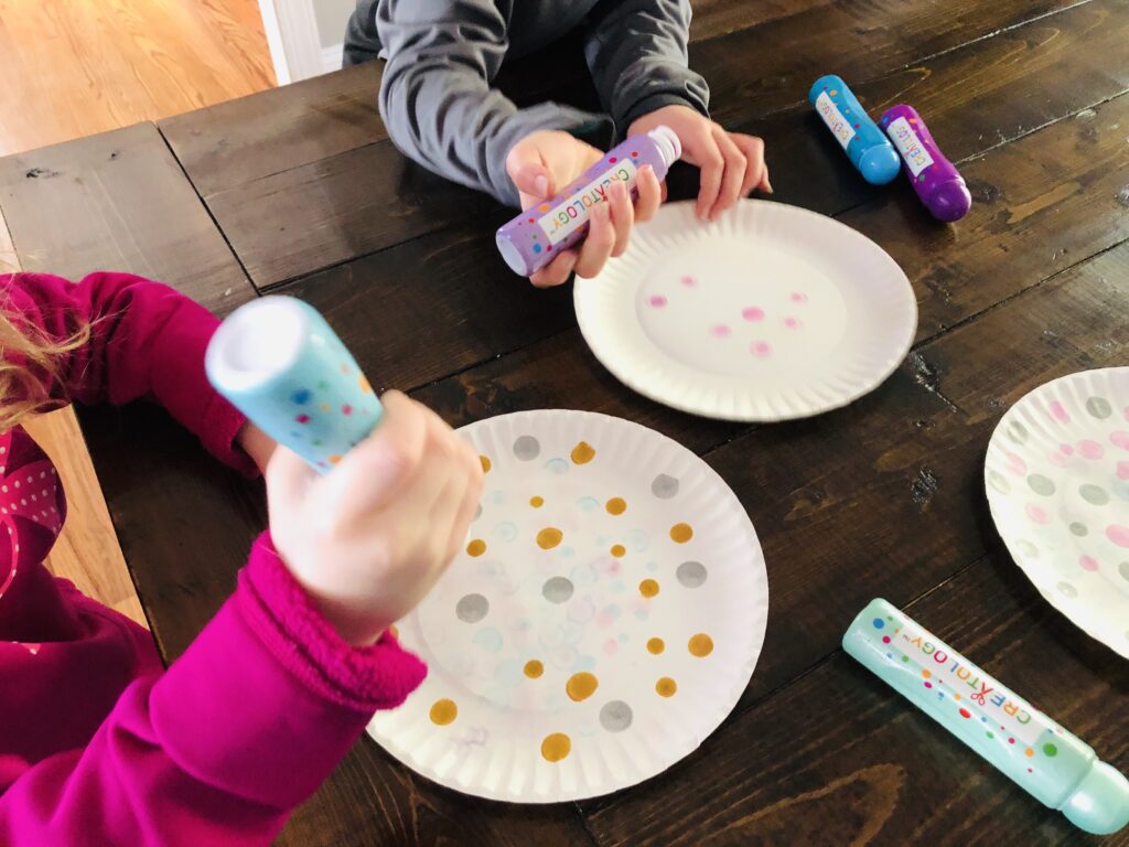 Creating Paper Plate Snowflakes with Dot Markers