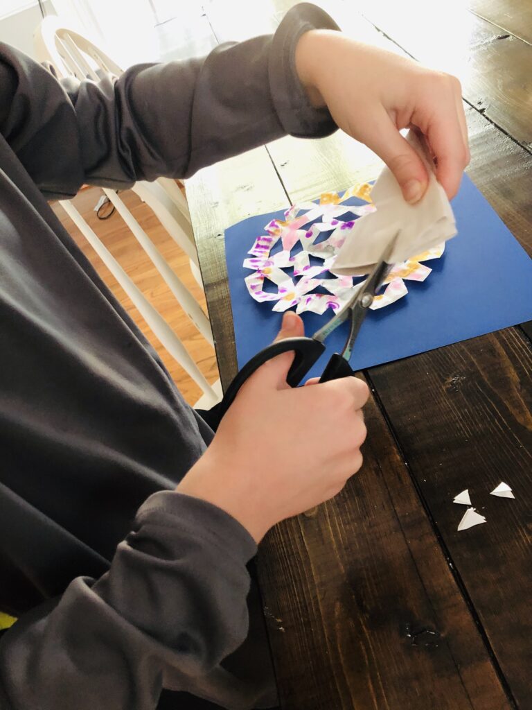 Cutting to create paper snowflakes
