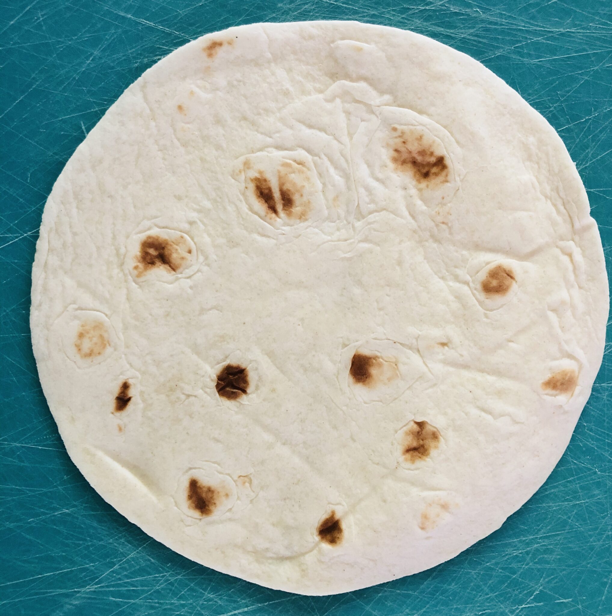 Baked Snowflake Tortillas with Powdered Sugar Glitter On A Dime