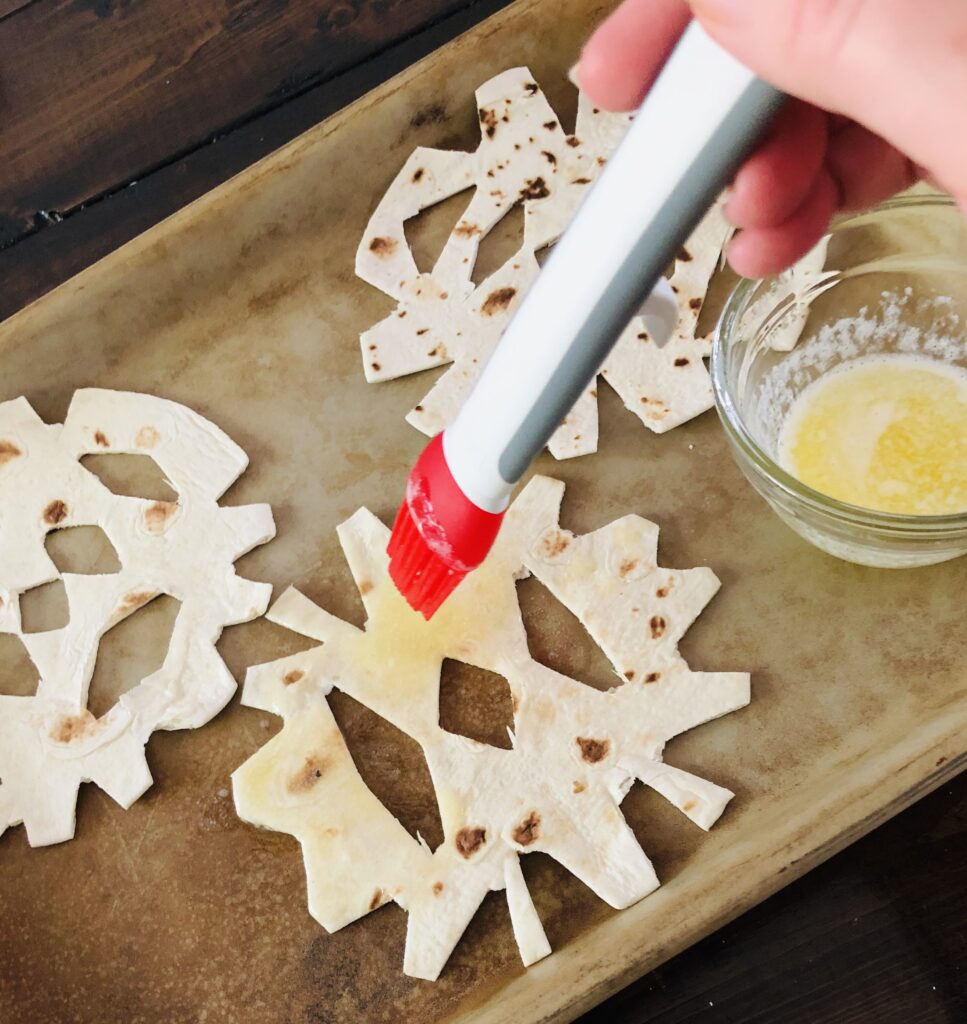 Brush the tortillas with butter