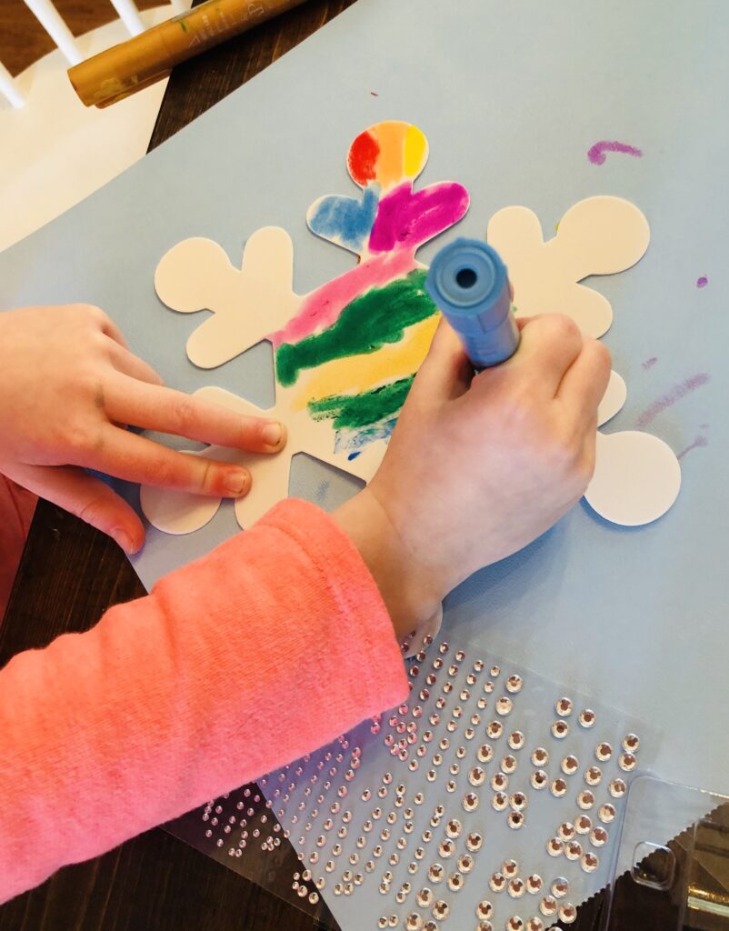 Coloring Rainbow Snowflakes with Kwik Stix Paint