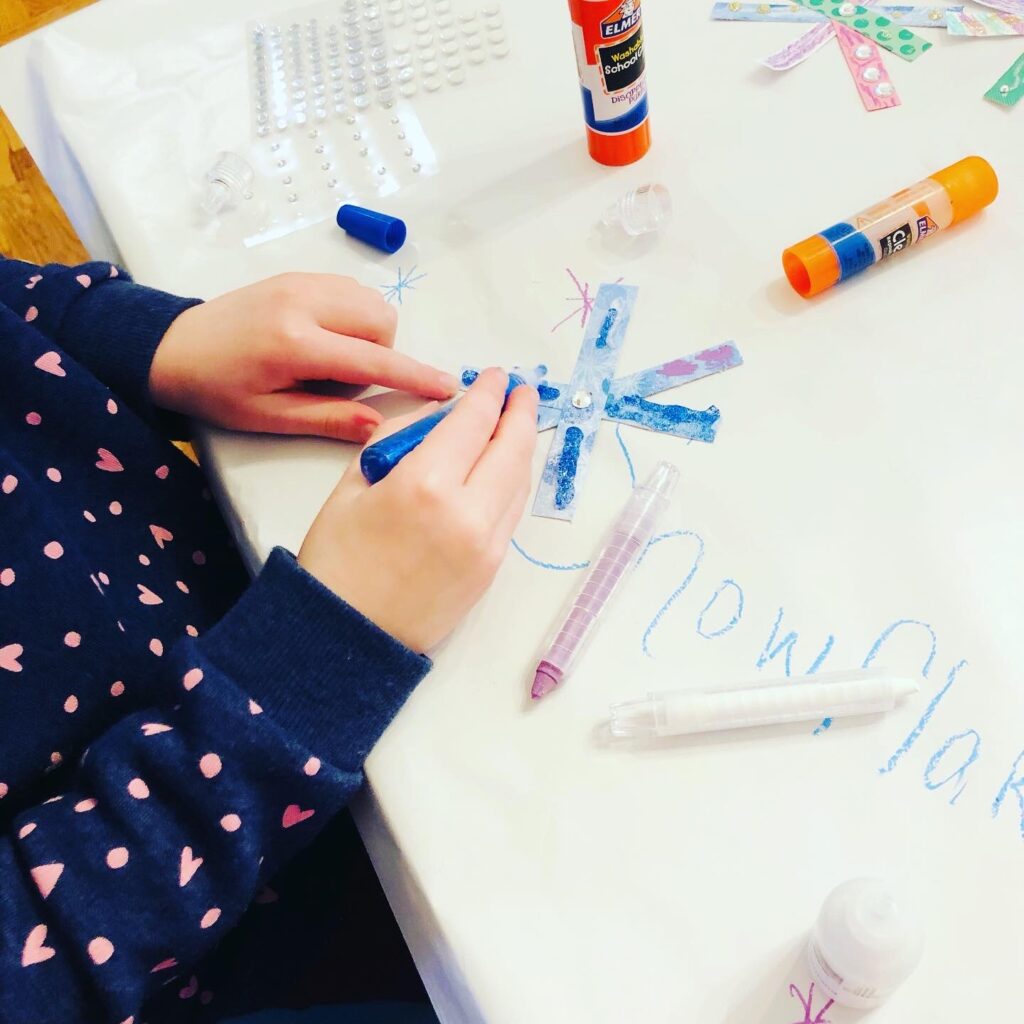 Creating Paper Strip Snowflakes with Kids